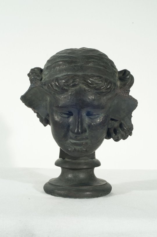 Cabeza de Hypnos [según copia romana en el Museo Británico]